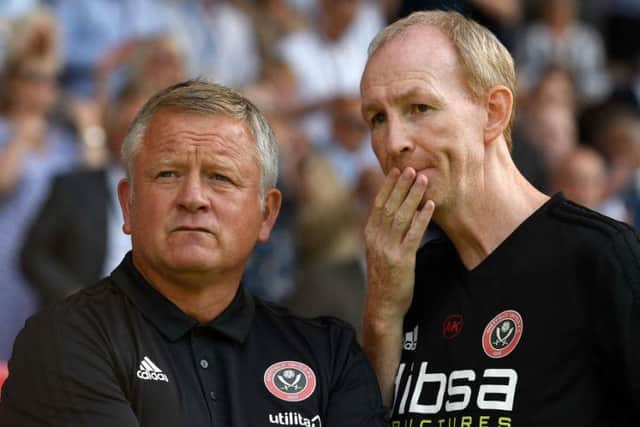 Chris Wilder and assistant manager Alan Knill