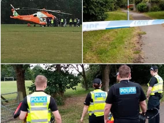 Police and the air ambulance at the playing fields where a man was attacked in Ecton Brook