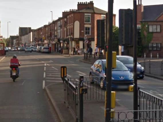 A man was robbed in Kettering Road by a man and a woman who then headed down Hood Street.