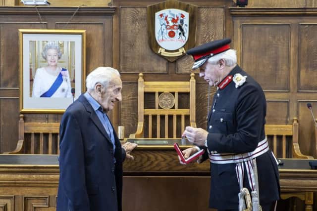 HM Lord-Lieutenant David Laing surprised Albert by calling him up to present him with the Legion of Honour.