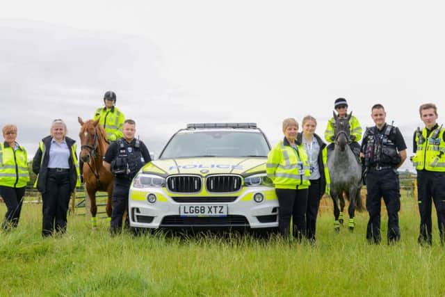The volunteers of horseback riders with the road safety team