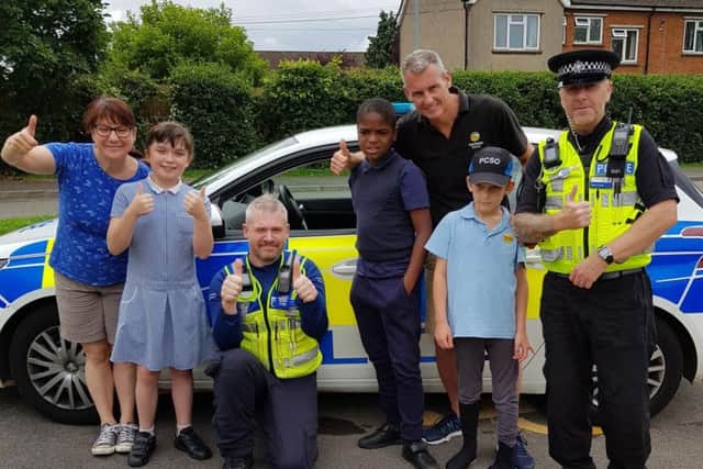 Staff and pupils from Fairfields School with police officers after their visit. Photo: Northamptonshire Police