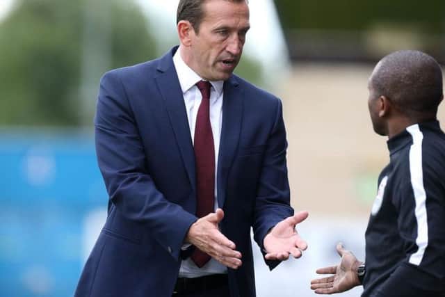 Justin Edinburgh managed the Cobblers from January to August in 2017