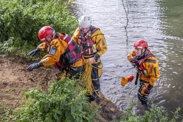 Last week firefighters demonstrated a 'person rescue' at the University of Northampton whereby a firefighter goes into the water - in full kit - to rescue someone who might have fallen unconscious. (File picture).