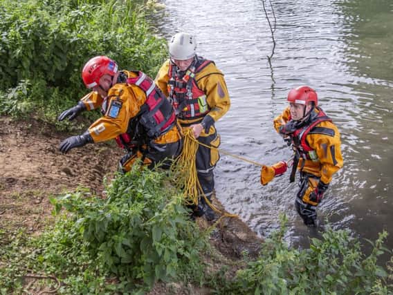 Last week firefighters demonstrated a 'person rescue' at the University of Northampton whereby a firefighter goes into the water - in full kit - to rescue someone who might have fallen unconscious. (File picture).