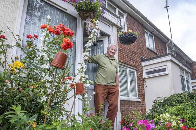 87-year-old Tony enjoys pottering around in his garden and it's the brightest in the row of houses.
