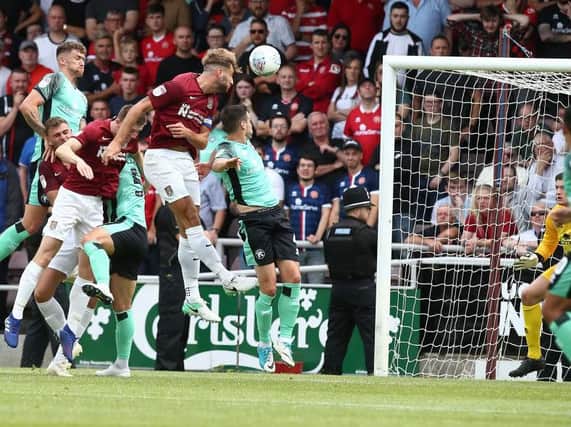 Charlie Goode heads towards goal in the Cobblers' 1-0 defeat to Walsall (Picture: Pete Norton)