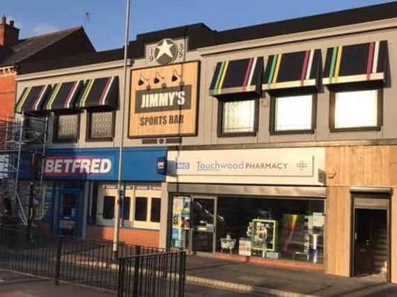 Jimmy's Sports Bar wants to build a rooftop smoking terrace - but they've come up against a problem.