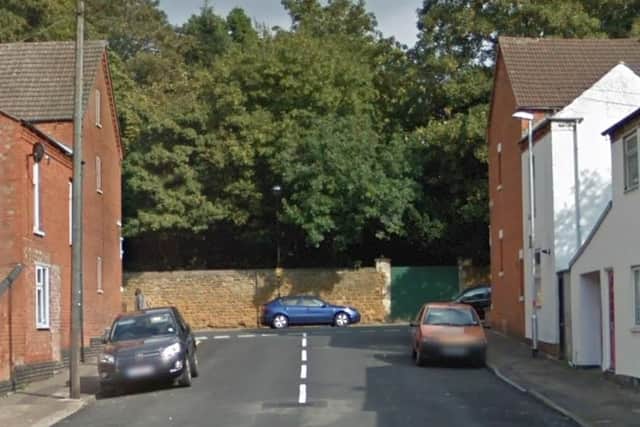 Two masked men stole cash and a scratch card stand from a shop in Stanley Street.