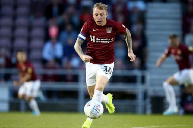 Nicky Adams on the ball during Tuesday's defeat to Peterborough. Picture: Pete Norton