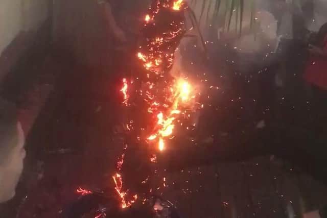 The tree could be seen smouldering in the beer garden. Credit: @oocnorthampton.