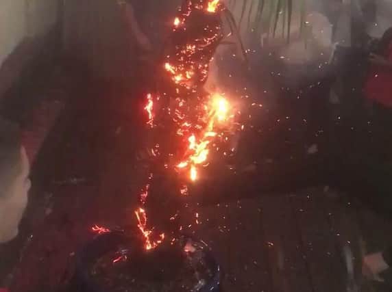 The tree could be seen smouldering in the beer garden. Credit: @oocnorthampton.