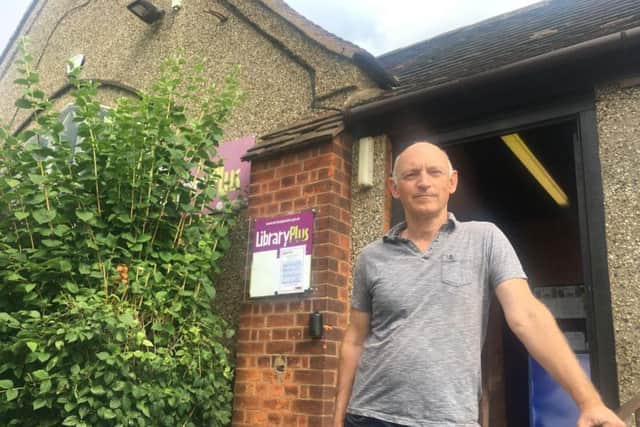 Friends of Abington Library vice chairman Martin Sawyer outside the under-threat library