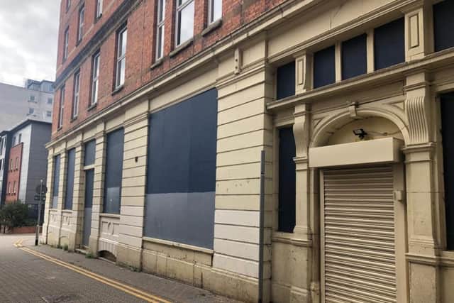 The shop, behind the opticians, is set to become a home for six people.