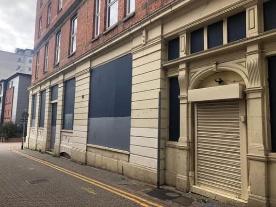 The shop, behind the opticians, is set to become a home for six people.