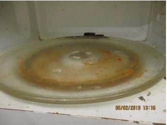 The inside of the microwave was found to be dirty at the time of the inspection.