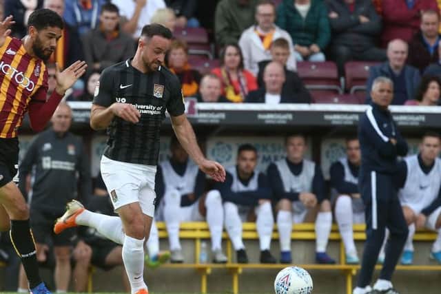 Keith Curle watches on as Matty Warburton makes a break during last Saturday's defeat at Bradford City