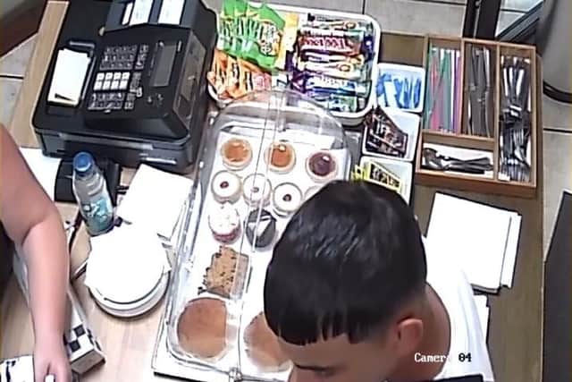 The smaller of the two distracted Colin Inglis while his accomplice manipulated the card machine.