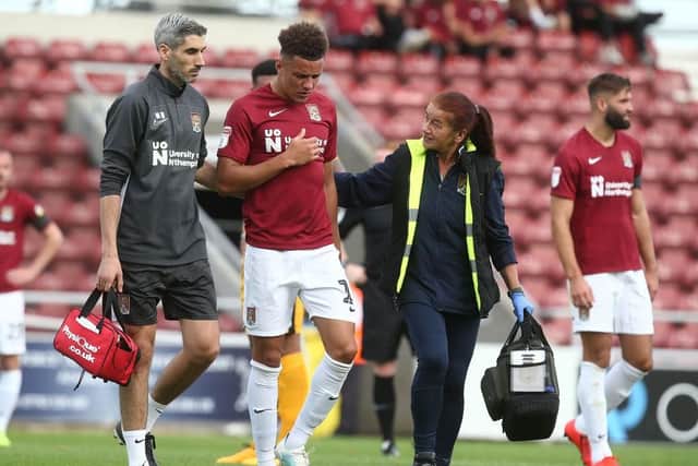 Shaun McWilliams leaves the field with chest problems. Picture: Pete Norton
