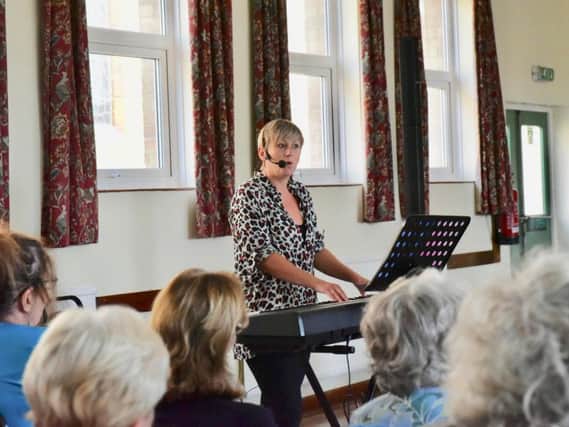 Jess Hunting (pictured) is already an established musician, singer and former Rock Choir coach and is joining the Singing4Breathing group. Picture by Louise Smith.