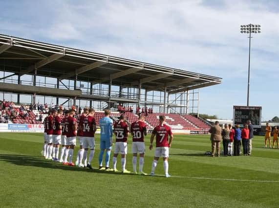 Cobblers held a minute's applause in memory of club president Bob Church MBE. Picture: Pete Norton