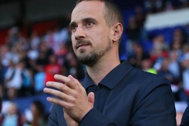 Mark Sampson has taken temporary charge of Stevenage following Dino Maamria's sacking.