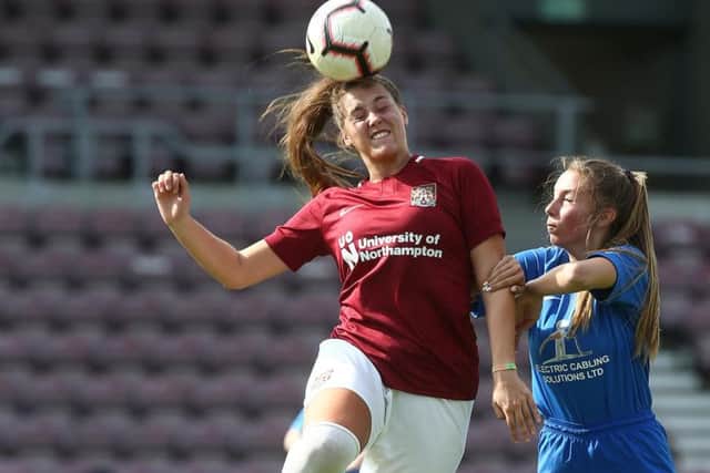Cesca Partridge wins this aerial battle