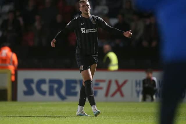 Harry Smith shows his disappointment after being sent off