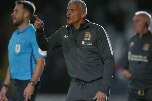 Keith Curle gets his point across during the Cobblers' 1-0 win at Stevenage (Picture: Pete Norton)