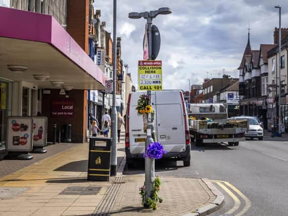 Floral tributes were left at the scene of a fatal crash on Wellingborough Road on August 17