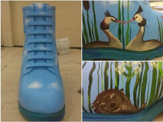 The Nene Valley Boot is covered in images from the nature park, including reeds, grebes and and otter