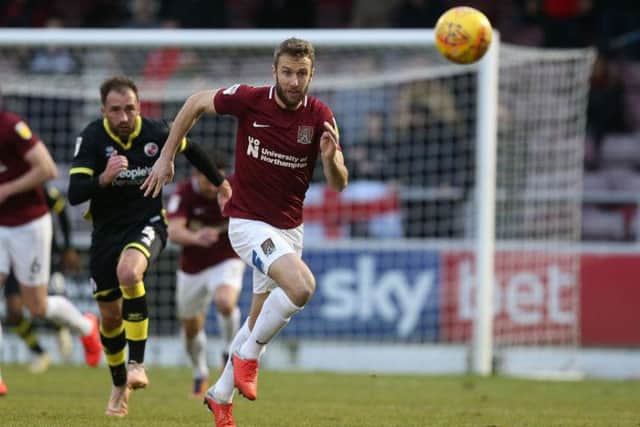 Andy Williams chases after the ball during February's goalless draw with Crawley.