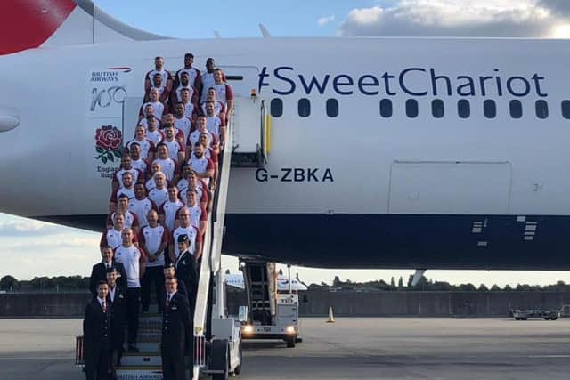 The England squad board their flight to Japan