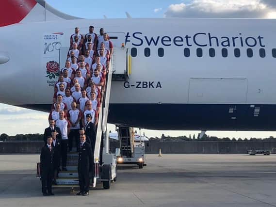The England squad board their flight to Japan