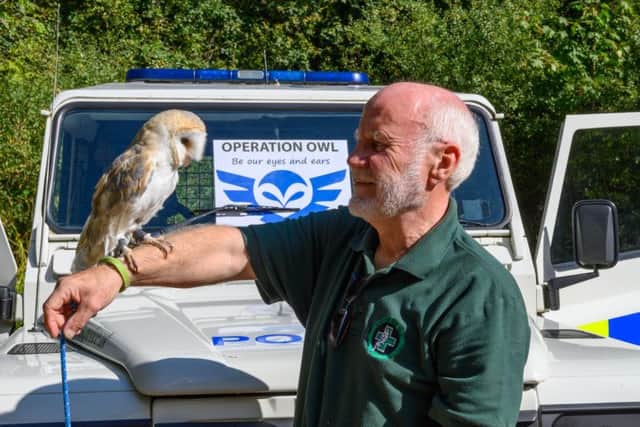 A Raptor Rescue handler with a barn owl at the Operation Owl launch in Salcey Forest. Photo: Northamptonshire Police
