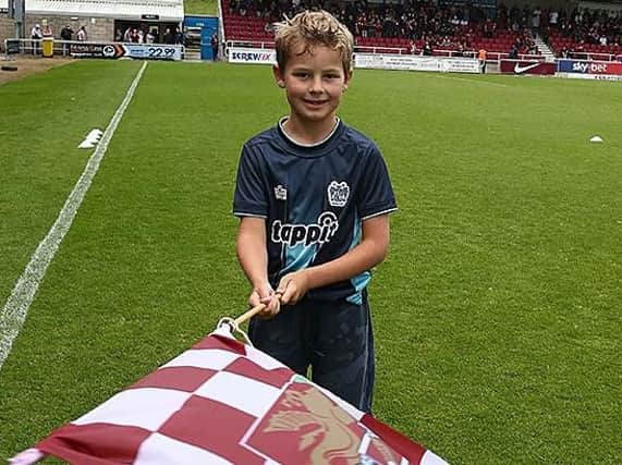 Young Bury fan Dan Milner will be a Cobblers match day mascot on Saturday