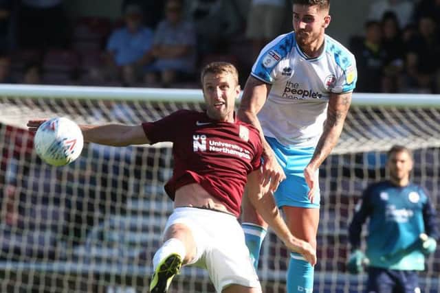 Andy Williams battles for the ball