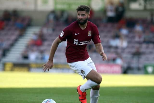 Fabulous last-ditch challenge on Bloomfield as he burst through on goal was the highlight of another effective and tidy display at the base of Town's midfield... 7