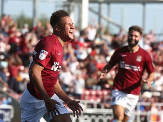 An ecstatic Shaun McWilliams sets off to celebrate his first Cobblers goal. Picture: Pete Norton