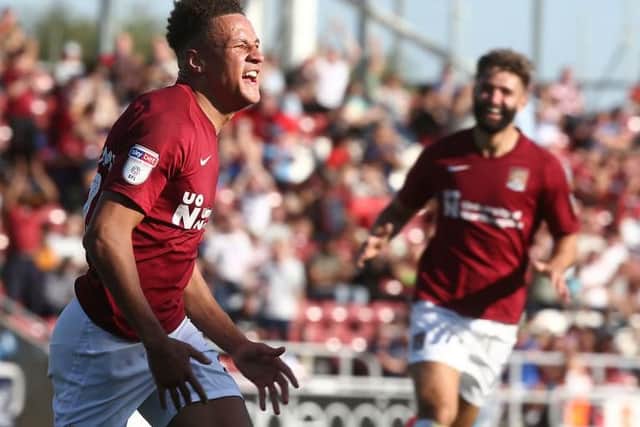 Shaun McWilliams shows his delight after scoring his first goal for the Cobblers