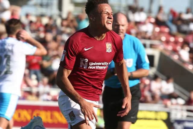 A delighted Shaun McWilliams celebates scoring his first goal for the Cobblers