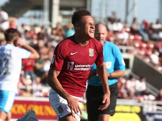 A delighted Shaun McWilliams celebates scoring his first goal for the Cobblers