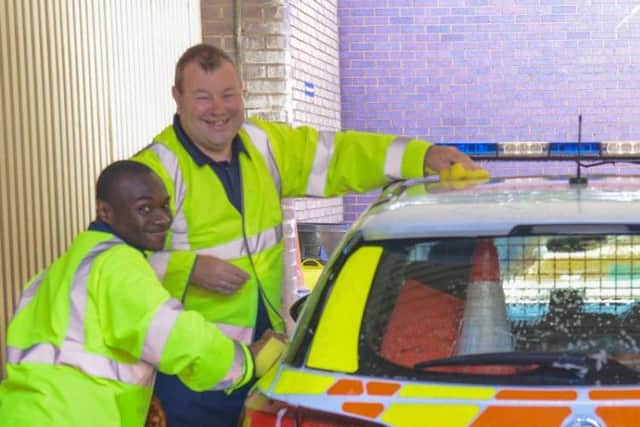 LIVE volunteers wash a car at Weston Favell Police Station. Photo: Northamptonshire Police