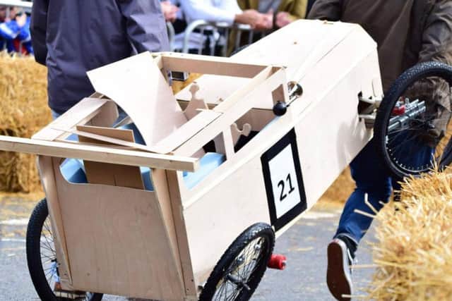 Of course, it isn't a soapbox derby without a few spills and accidents...