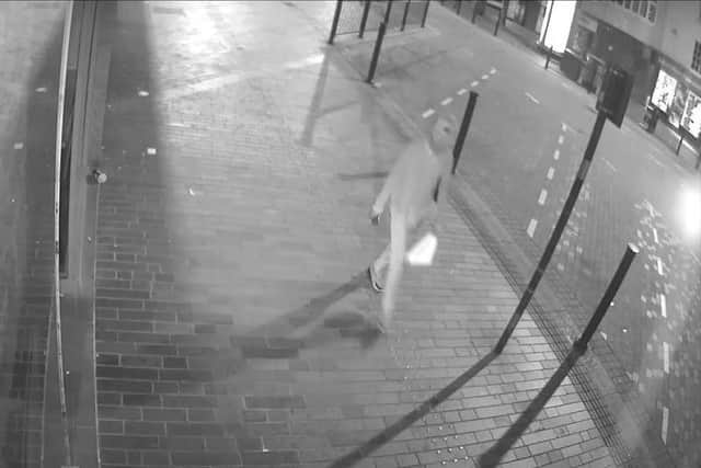 A man is wanted in connection to a rape in Magee Street after following a woman from out of town centre.