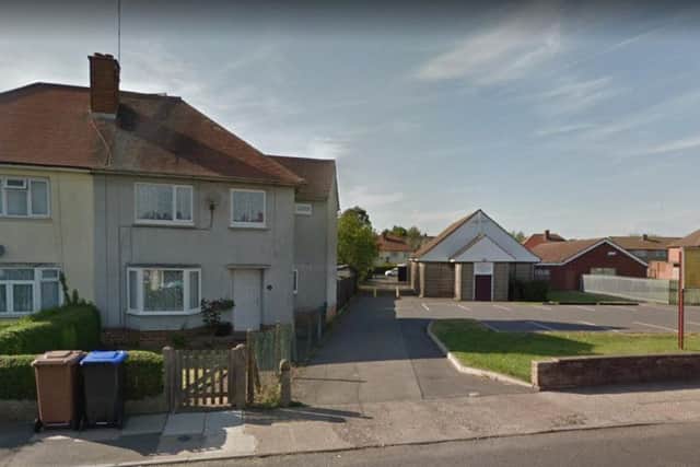 The woman was walking along an alleyway linking Fullingdale Court and The Headlands, near to Headlands United Reform Church, in Northampton, when she was robbed