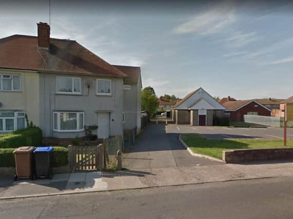 The woman was walking along an alleyway linking Fullingdale Court and The Headlands, near to Headlands United Reform Church, in Northampton, when she was robbed