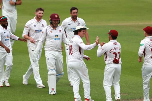 Northants celebrate claiming a wicket in the draw with Lancashire in July