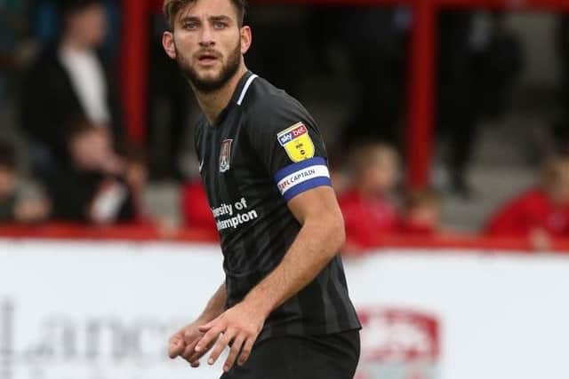 Far busier afternoon than he'd have liked, particularly second-half, but some desperate last-ditch defending was keeping Morecambe at bay until Ellison's leveller. Cautioned for a wild challenge in the first-half... 6.5