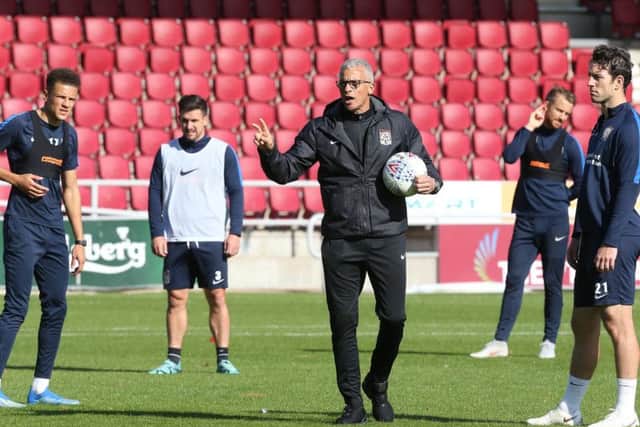 Keith Curle taking his first training session at the Cobblers